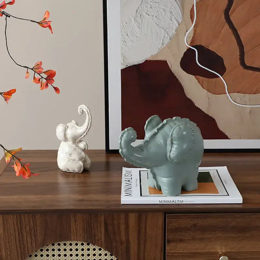 Matte sage green ceramic elephant abstract bubble sculpture with textured finish and silver beading for home decor
