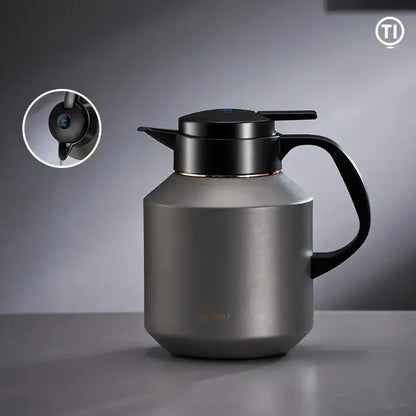 Matte gray stainless steel thermal carafe with black lid and handle featuring sleek modern design decorbites insulation pot