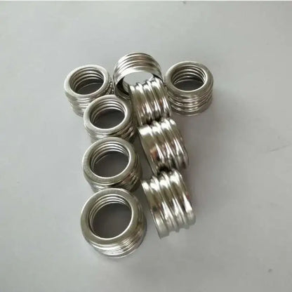 Shiny metallic threaded insert rings for e40 lamp holder adapter pack used in garage workshop lighting
