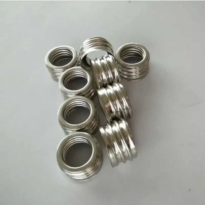 Shiny metallic threaded insert rings for e40 lamp holder adapter pack used in garage workshop lighting