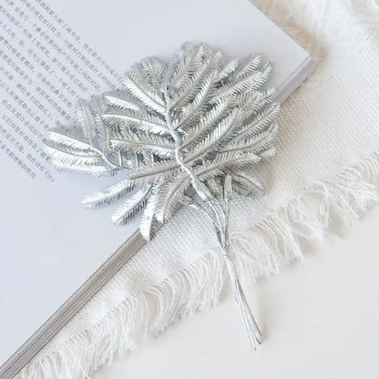 Silver metallic fern-shaped decorative pin from decorbites gold palm leaves living room palm leaves decor