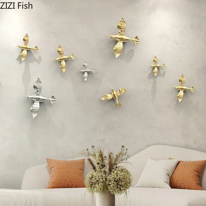 Metallic gold and silver pigeon wall art sculptures as living room dove statue ornaments in metal finish