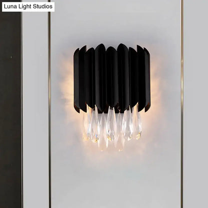 Mid century black metal wall sconce with cascading crystal droplets compatible with e12 light bulb for bedroom use