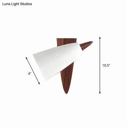 Mid-century white cone metal wall sconce with dark wood base designed for modern bedroom lighting