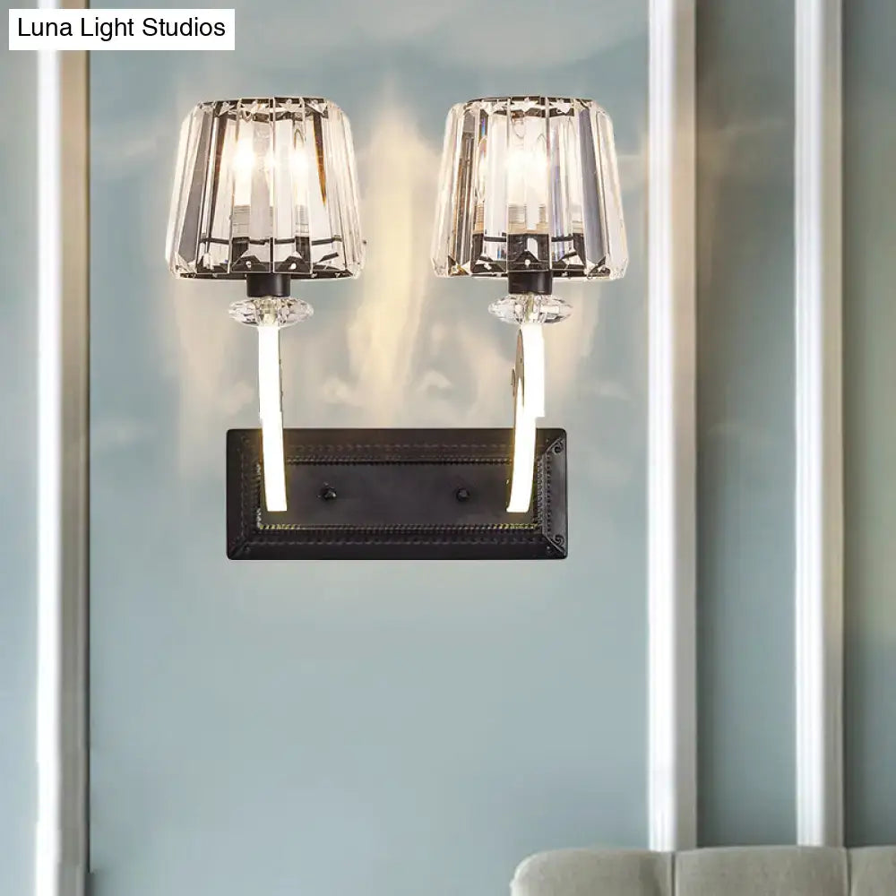 Crystal-framed dual-light wall lamp with cone shade, dark bronze base, and clear glass for bedroom lighting