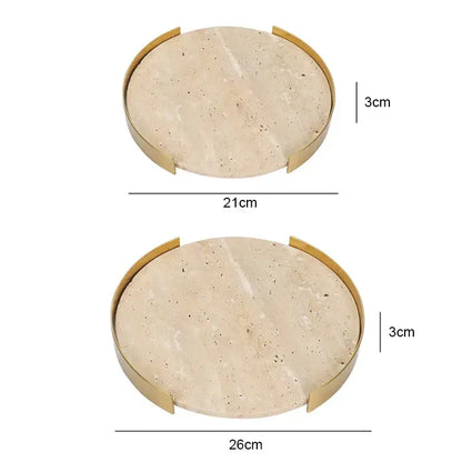 Two oval serving trays with beige brown travertine marble surfaces and gold metal frames for minimalist dining room decorbites decor