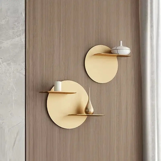 Minimalist beige round metal wall storage shelf with circular design and slender horizontal ledge for living room wall storage