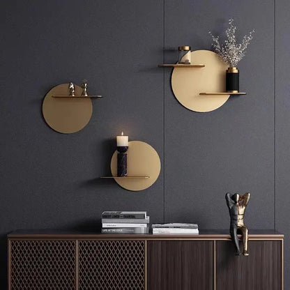 Minimalist beige round metal wall storage shelf with gold-toned circular design for living room wall storage