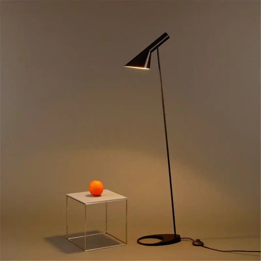 Minimalist black adjustable led floor lamp with a sleek conical shade and slender metal stand for living room decorbites floor lamp
