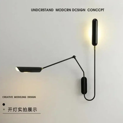 Minimalist black adjustable vintage wall lamp with sleek articulated arm and cylindrical light head for bedroom reading light