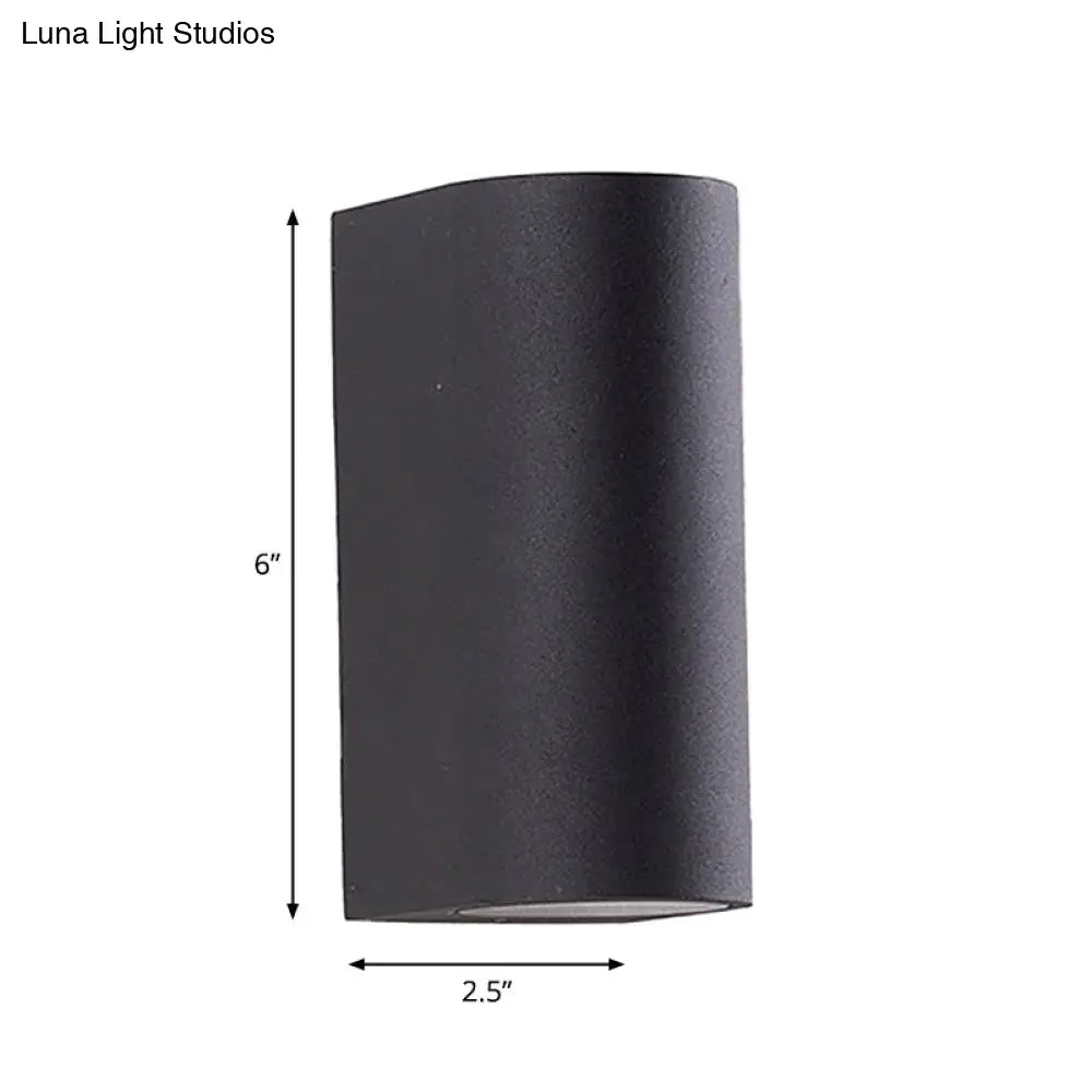 Minimalist black aluminum outdoor cylinder wall light with matte finish 6 inches tall for direct wired electric outdoor space