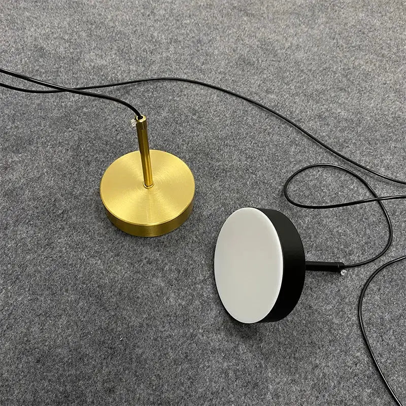 Minimalist black and frosted white pendant light with frosted white acrylic shade for dining room illumination