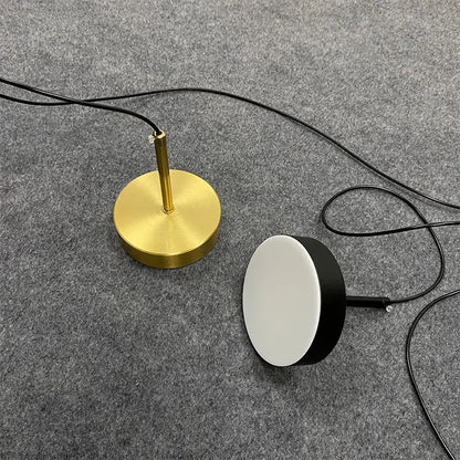 Minimalist black and frosted white pendant light with frosted white acrylic shade for dining room illumination
