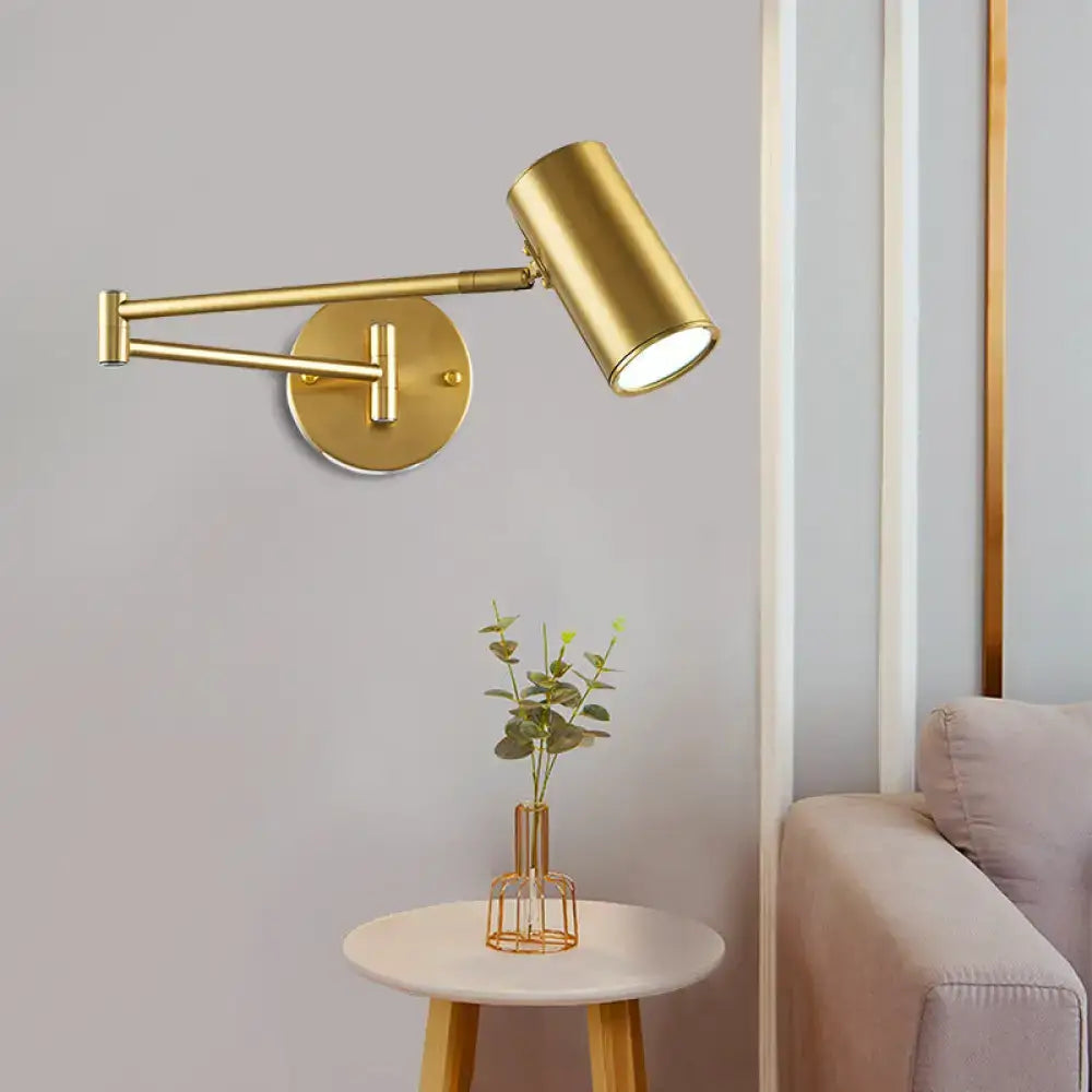 Gold finished black gold adjustable wall-mounted cylinder reading lamp with articulated arm for minimalist bedroom use