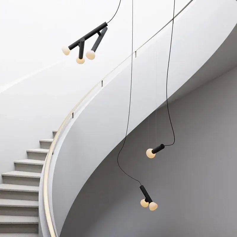 Minimalist black and cream glass pendant lights with sleek modern design for dining room pendant light fixtures