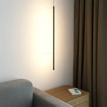 Minimalist black and white metal pendant light with sleek cylindrical design ideal for modern kitchen fixtures