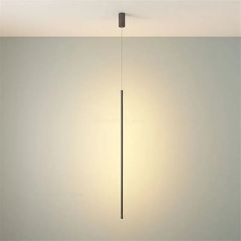 Minimalist black cylindrical pendant light with sleek modern design in white metal pendant kitchen fixture
