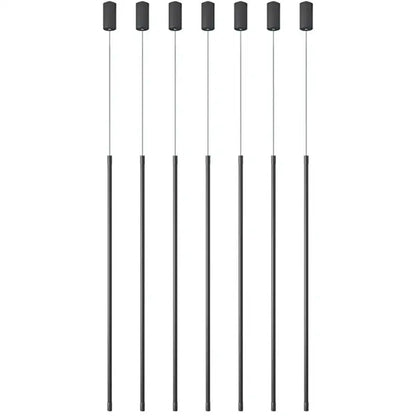Six sleek black cylindrical pendant lights with slender metallic rods in a minimalist black and white metal pendant light fixture