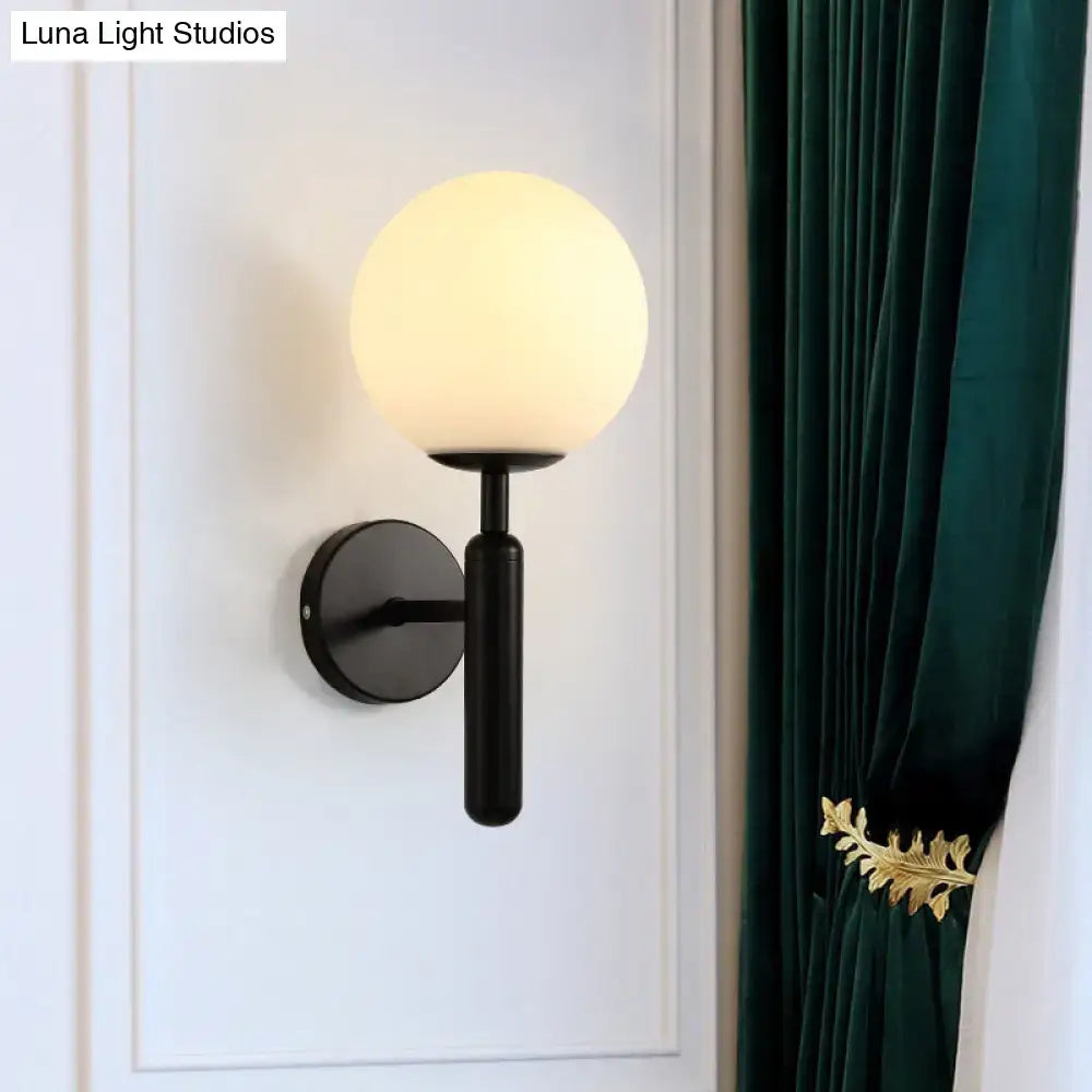 Minimalist black metal ball shade corridor light with frosted glass globe for bedroom wall sconce lighting