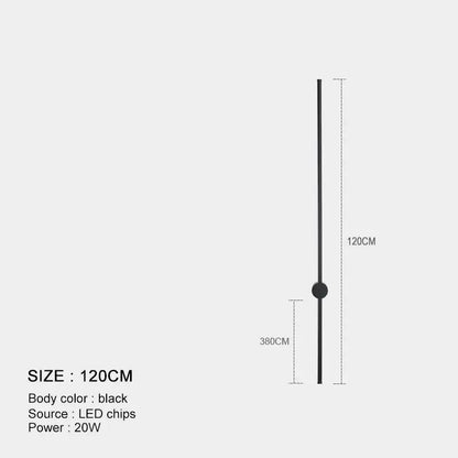 Minimalist black and brushed brass led wall lamp with sleek cylindrical body and spherical accent for living room use
