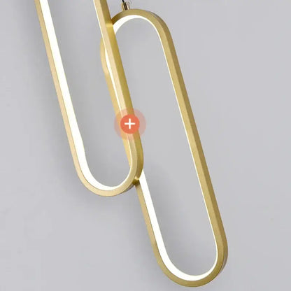 Gold-toned modern pendant light with sleek oval frames and built-in led for minimalist dining table lighting