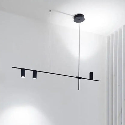 Minimalist black chandelier pendant lights with three cylindrical led bulbs on a sleek bar for dining room decorbites pendant lights