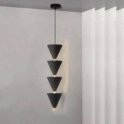 Minimalist black conical pendant light with four stacked geometric shades for decorbites cream bedroom chandelier