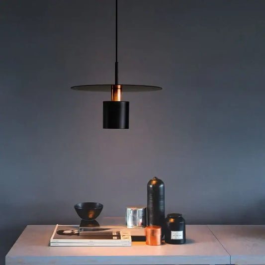 Minimalist black and copper iron art led chandelier with disc-shaped shade for bedroom pendant light decorbites iron art