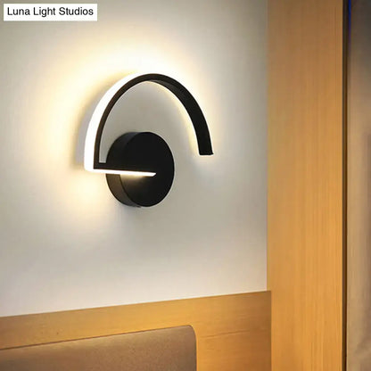 Minimalist black curved wall mounted lighting with integrated LED for modern bedroom wall mounted lighting solution