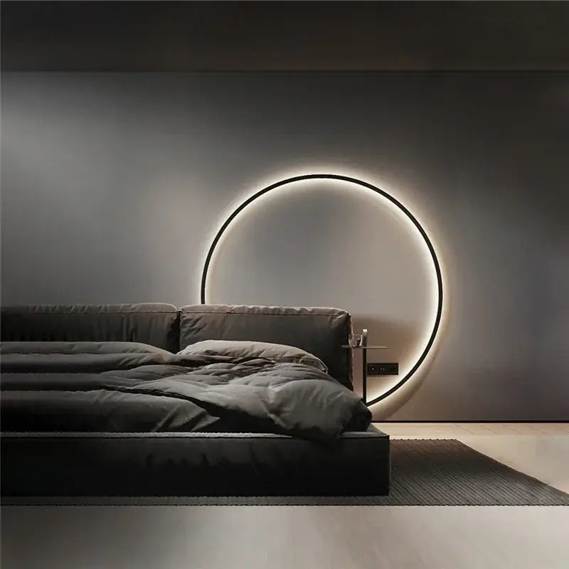 Minimalist black designer ring led wall light with a sleek circular frame and soft glowing illumination for living room decorbites designer ring wall light