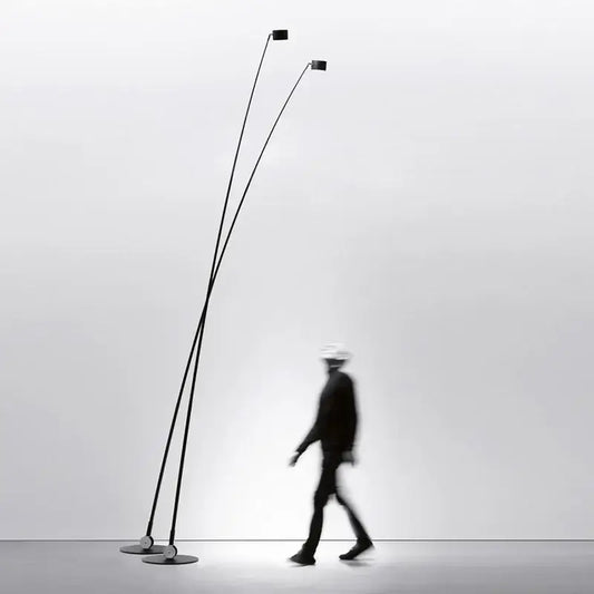 Minimalist black floor lamp with curved LED arms and circular light fixtures for modern living room decorbites black floor lamp