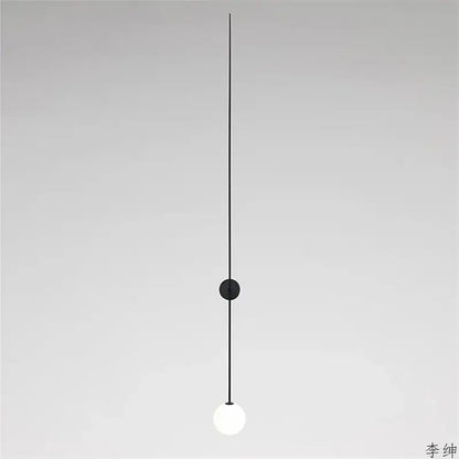 Minimalist black glass ball led wall light with frosted globe and slender cord for modern decorbites glass ball wall light