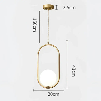 Minimalist black glass ball pendant lamp with gold-toned oval pendant light and frosted glass globe for dining room decorbites