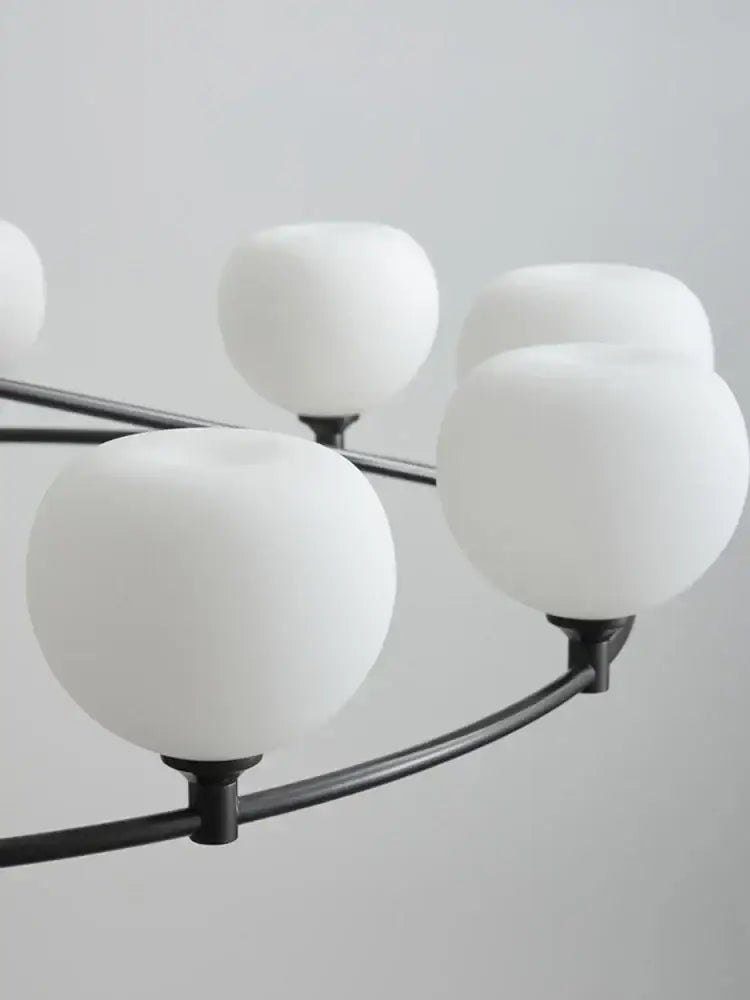 Minimalist black metal glass lampshade chandelier with frosted white globes for dining room decorbites glass lampshade