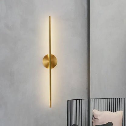 Minimalist black and gold copper wall sconce lamps with a gold-toned copper wall sconce emitting warm light for bathroom decorbites copper wall