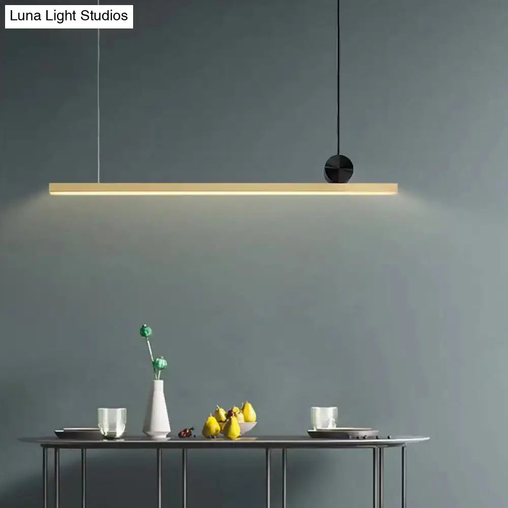 Minimalist black and gold finish linear led ceiling light with sleek modern design for kitchen island illumination