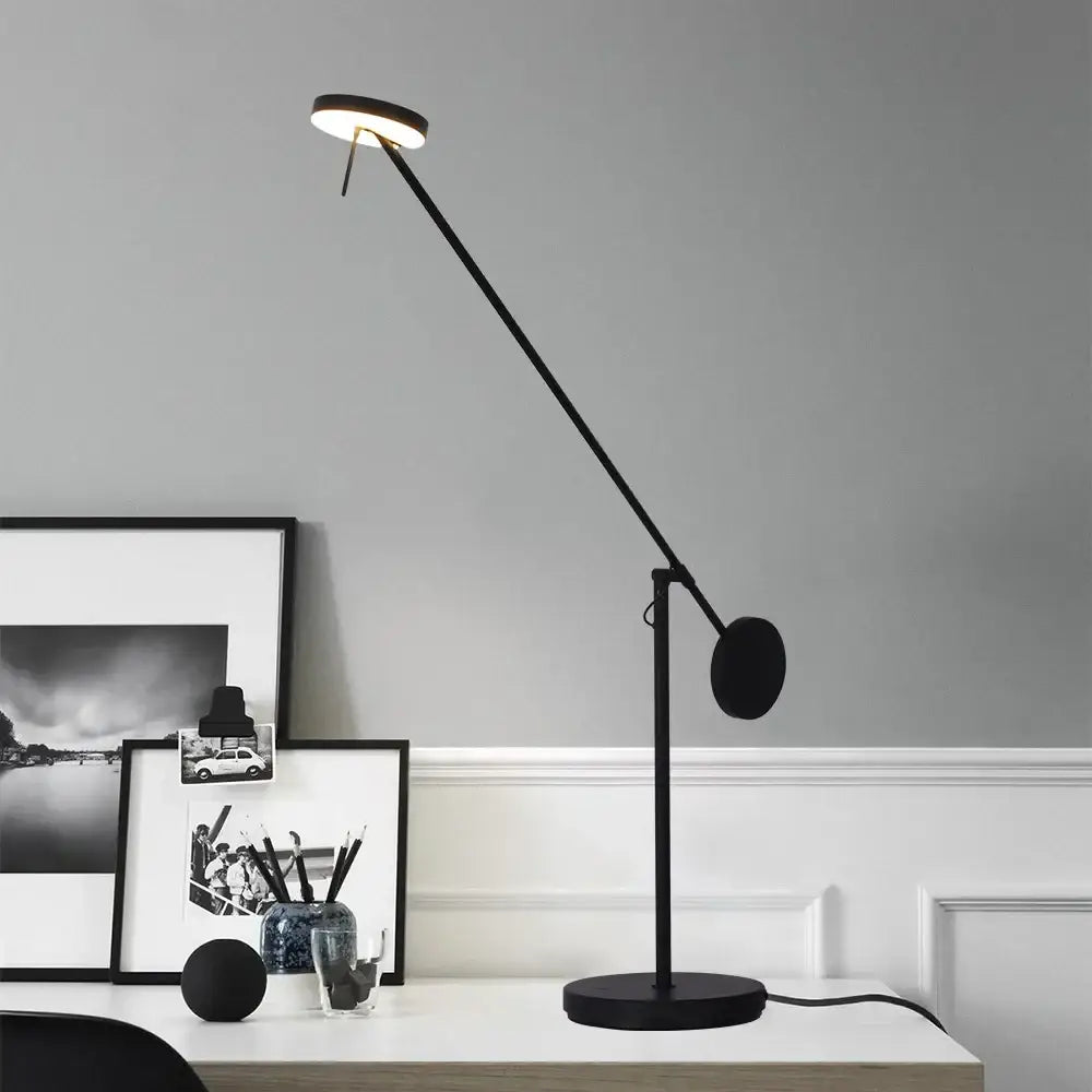 Minimalist black industrial swing arm table lamp with circular head and adjustable arm for bedroom decorbites industrial swing