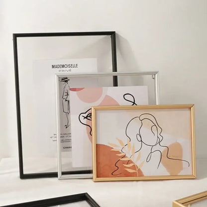 Gold-framed minimalist line art hangable picture frame with abstract peach and beige background for bedroom art