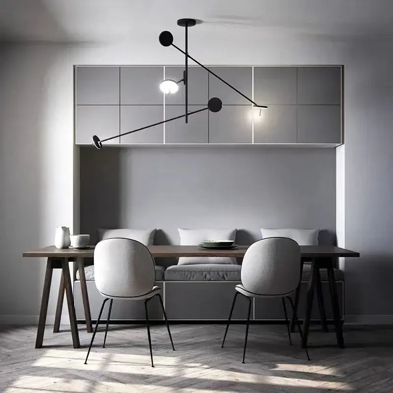 Minimalist black metal pendant light with spherical led fixtures for living room decorbites black metal design