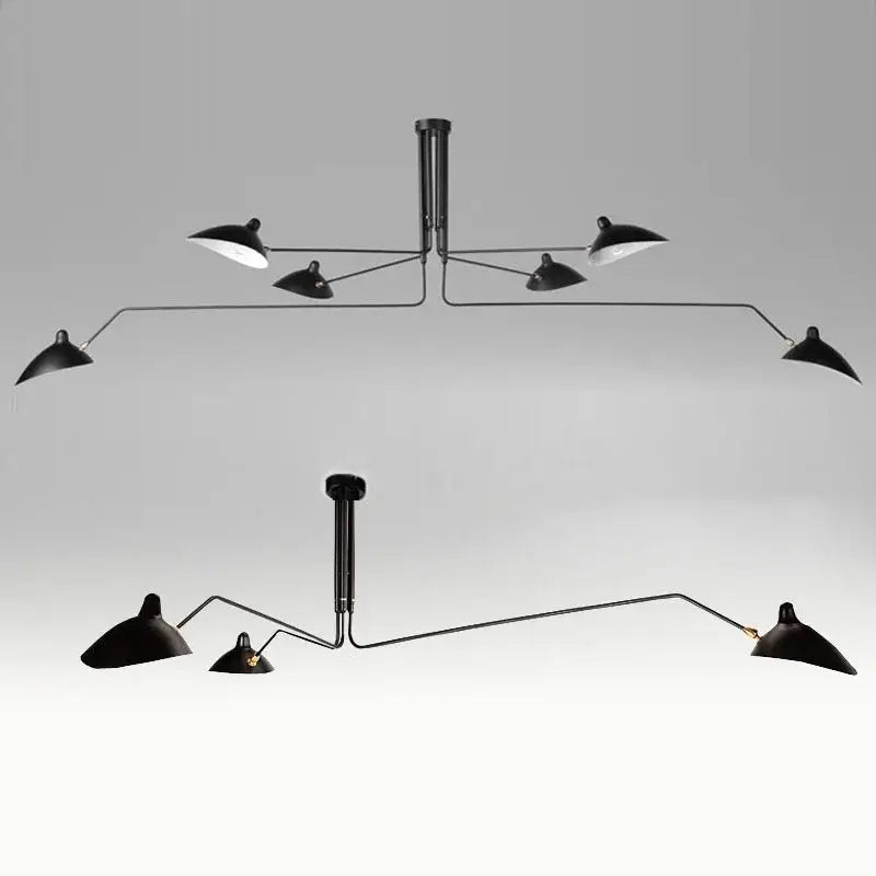 Minimalist black metal pendant light with articulated arms and conical shades for dining table use