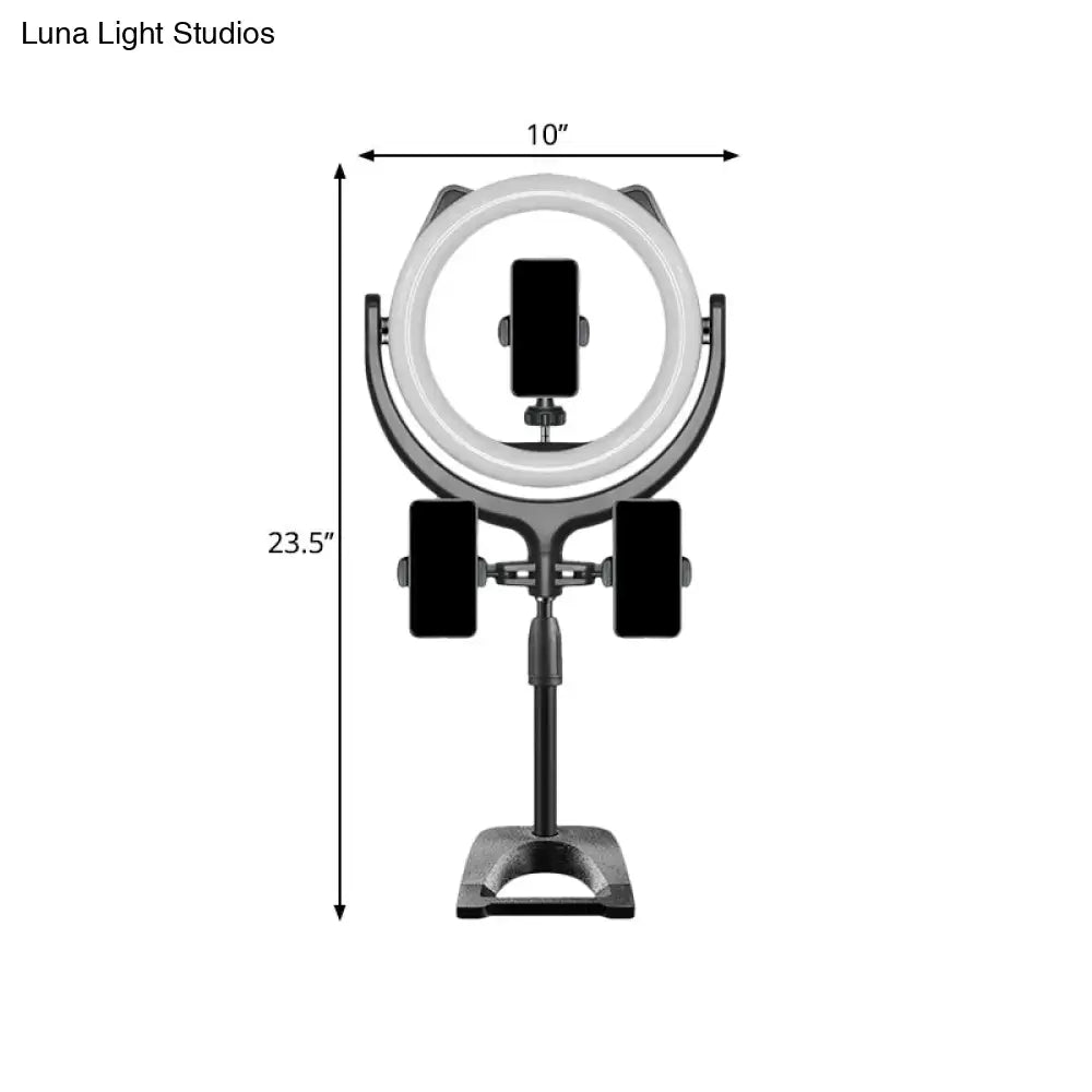 Minimalist black and silver led ring light with adjustable stand for phone photography and streaming setups