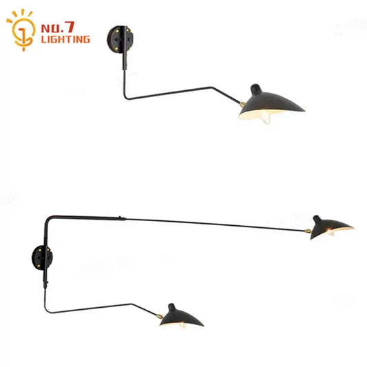 Minimalist black metal wall lamp with two adjustable arms designed for bedroom decorbites dawn spider serge lighting