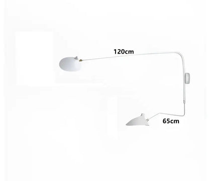 White minimalist wall lamp with sleek curved arm and oval shade from decorbites black serge mouille series for living room