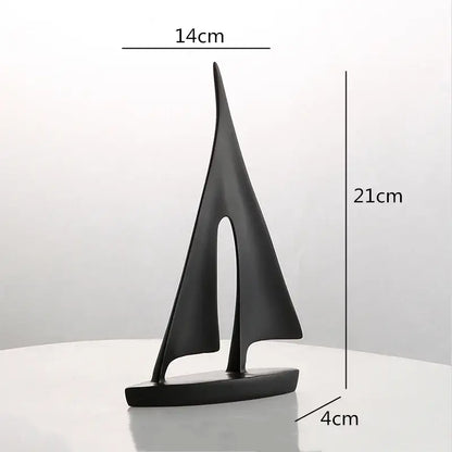 Minimalist black matte resin sailboat figurine with sleek modern design for abstract resin sailboat living room decorbites decor