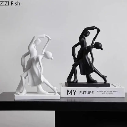 Minimalist black and white abstract resin sculpture by decorbites featuring two sleek dance figurines for living room decor