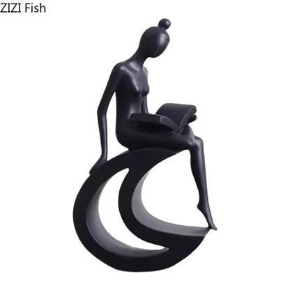 Black glossy resin figurine of a stylized woman reading on a crescent base decorbites abstract resin sculpture decor