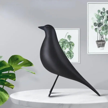Minimalist black matte resin craft bird peace dove sculpture with sleek design and slender legs for living room decorbites decor