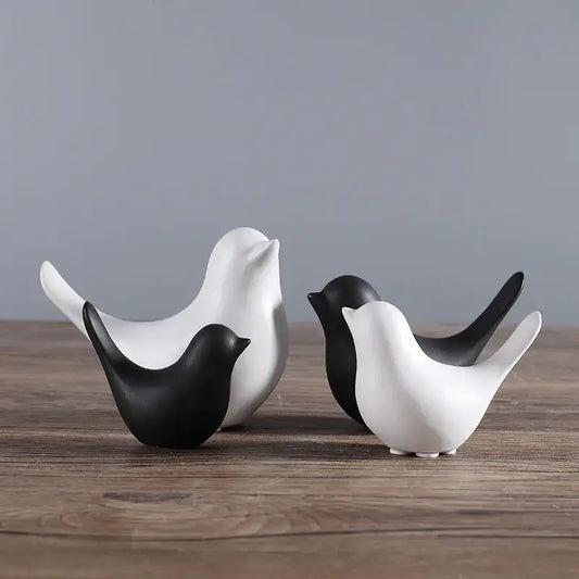 Minimalist black and white ceramic bird figurine set with smooth glossy finish for living room decor
