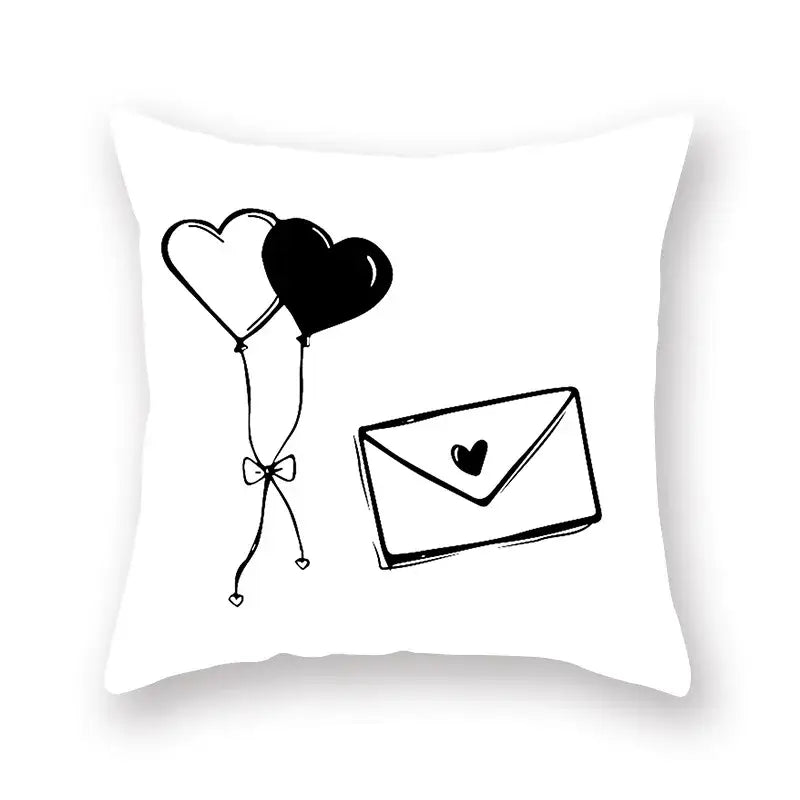 White throw pillow with black ink sketch of heart balloons and envelope on minimalist black geometric cushion cover decorbites black geometric