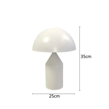 A sleek white decorbites iron mushroom table lamp with glossy finish and geometric base for minimalist bedroom lighting